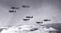 Photograph of cannon armed spitfires of East India Squadrons in flight. National Records of Scotland reference: NSC1/394/9